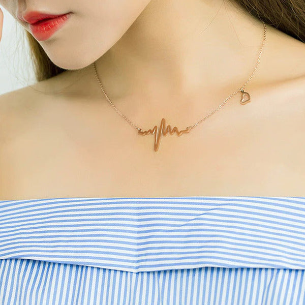 Gold & Silver Heartbeat Necklace